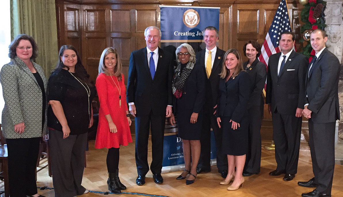 Barbara Ross-Lee with Arkansas Governor Asa Hutchinson and others.
