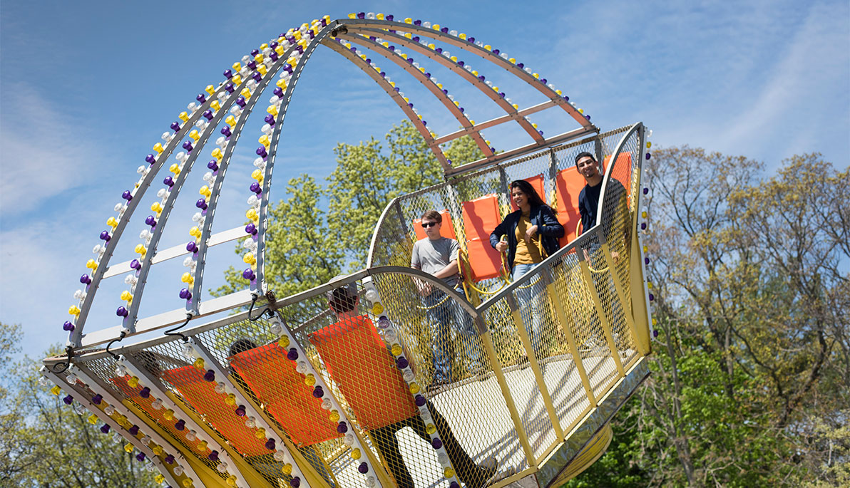 NYIT students on a ride at MayFest.
