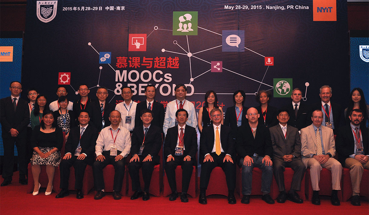 Experts and Senior officials pose at the 2015 MOOCs and Beyond conference