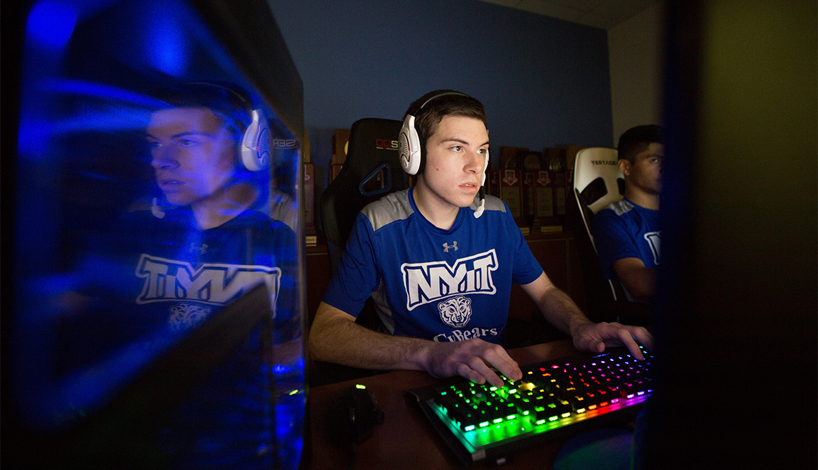 NYIT CyBears athlete playing video games.