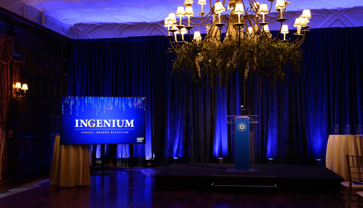 Screen that says Ingenium with a chandelier in the foreground