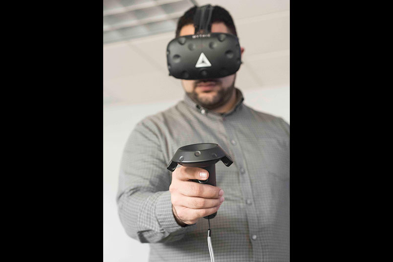Andy Christoforou wears the virtual reality gear.