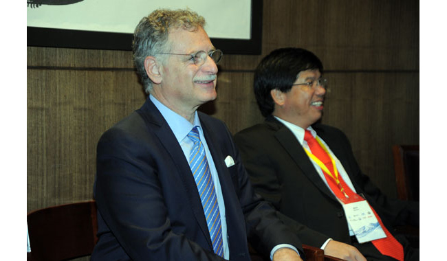 NYIT President Edward Guiliano, Ph.D., with Chunmiao Zheng, Ph.D., Professor and Chair of Water Resources and Director, Center for Water Research, Peking University