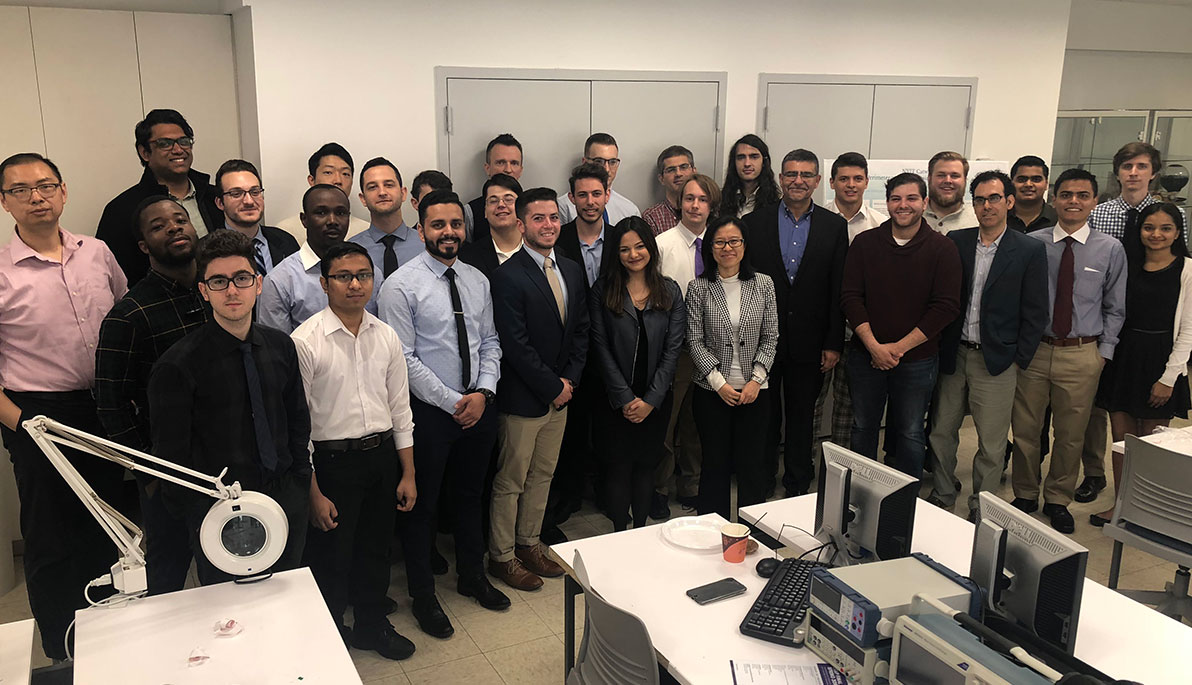 A group of undergraduate researchers posing for a photo.