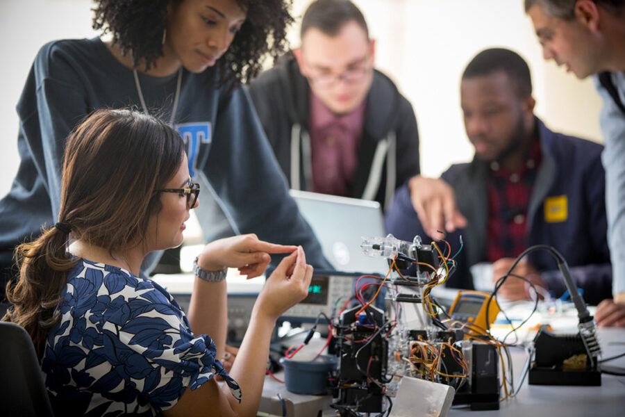 Electrical engineering students at a hands-on workshop