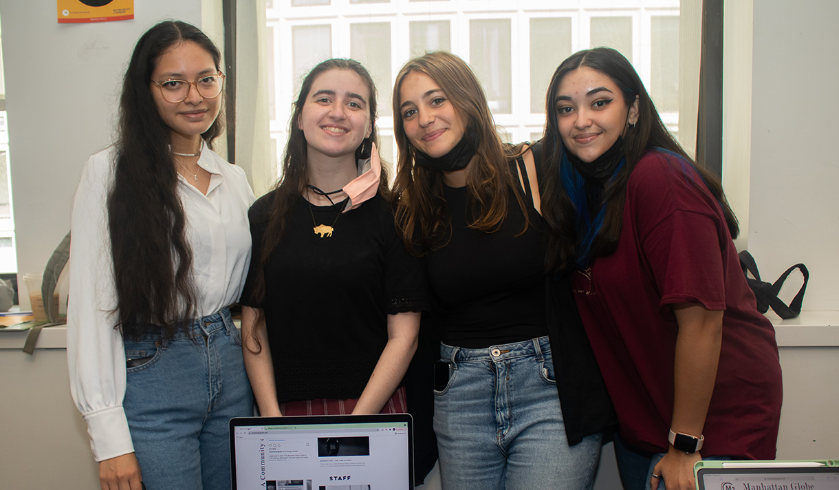 Four students posing for a photo.