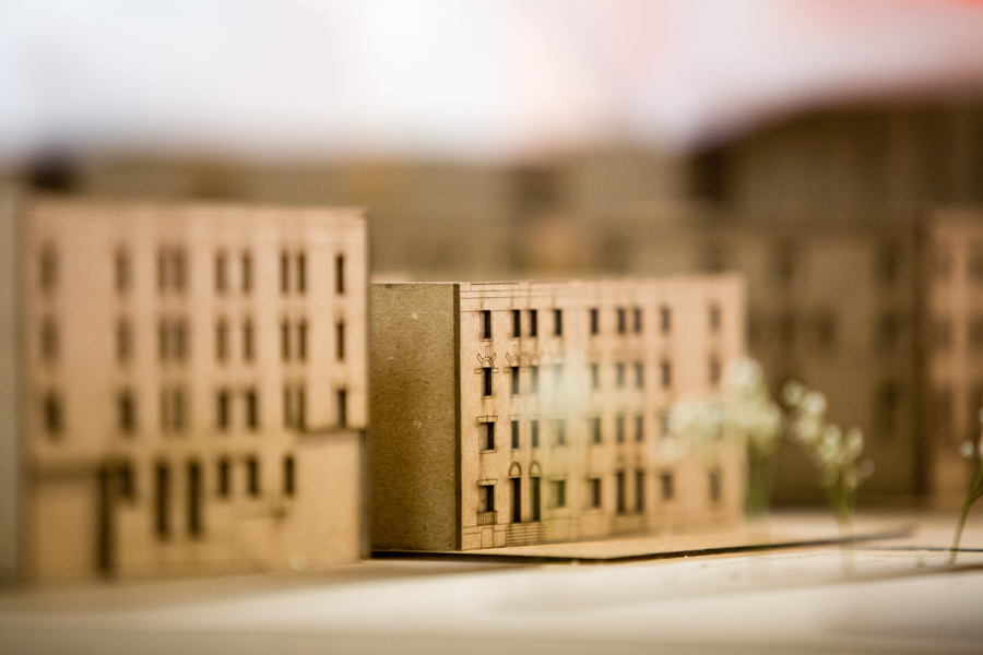 A model of a building shown slightly out of focus. 