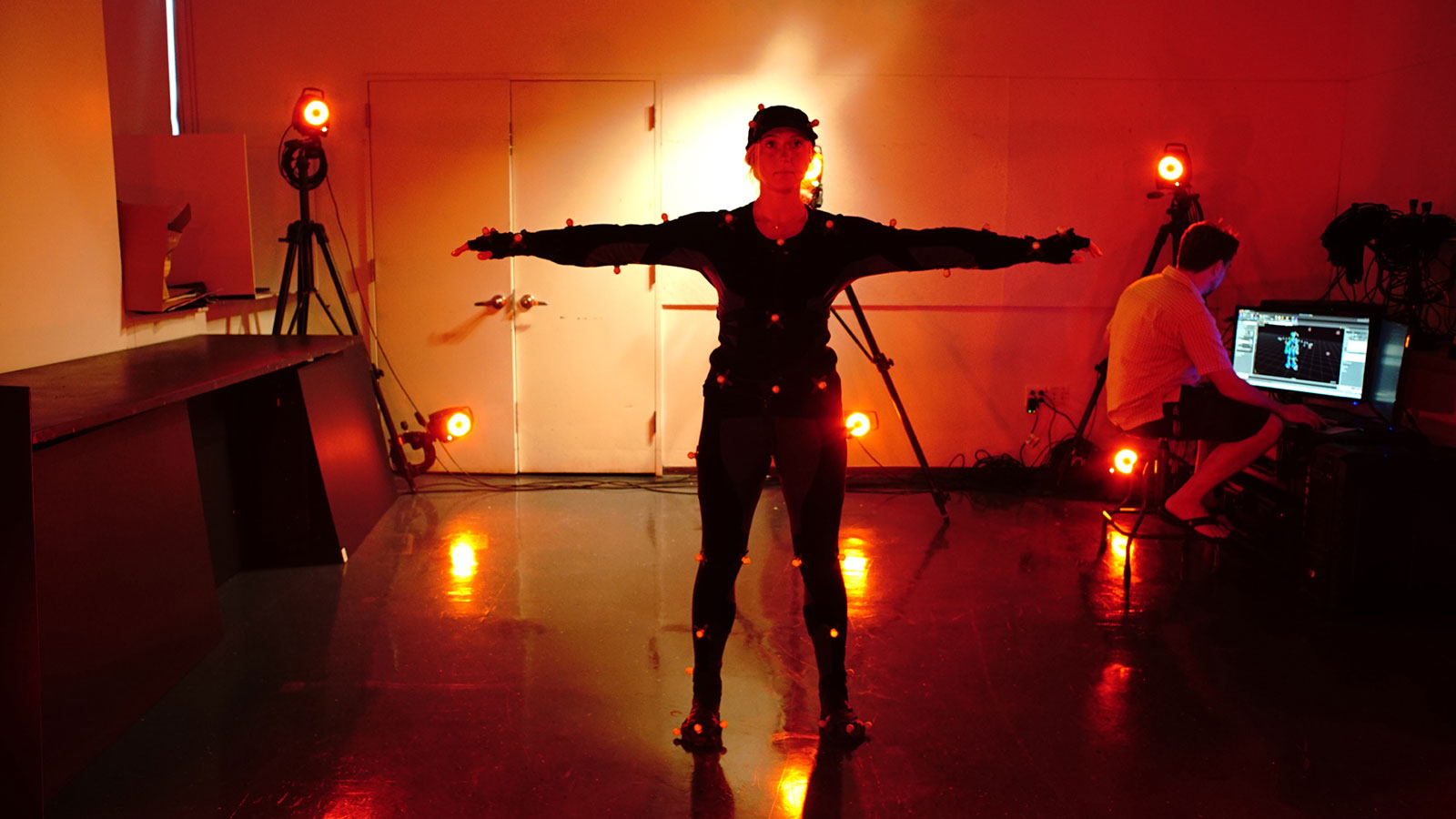 A student is hooked up to motion capture technology.