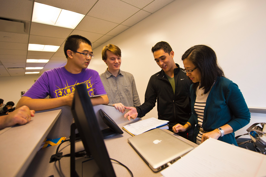 A faculty oversees students in the College of Engineering and Computing Sciences Co-op Program.