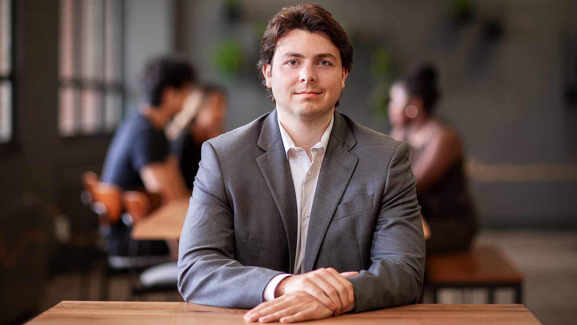 A student poses in business attire.