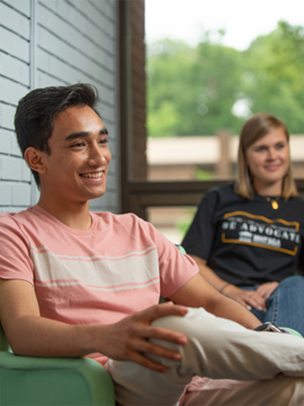 A student is listening in a classroom.