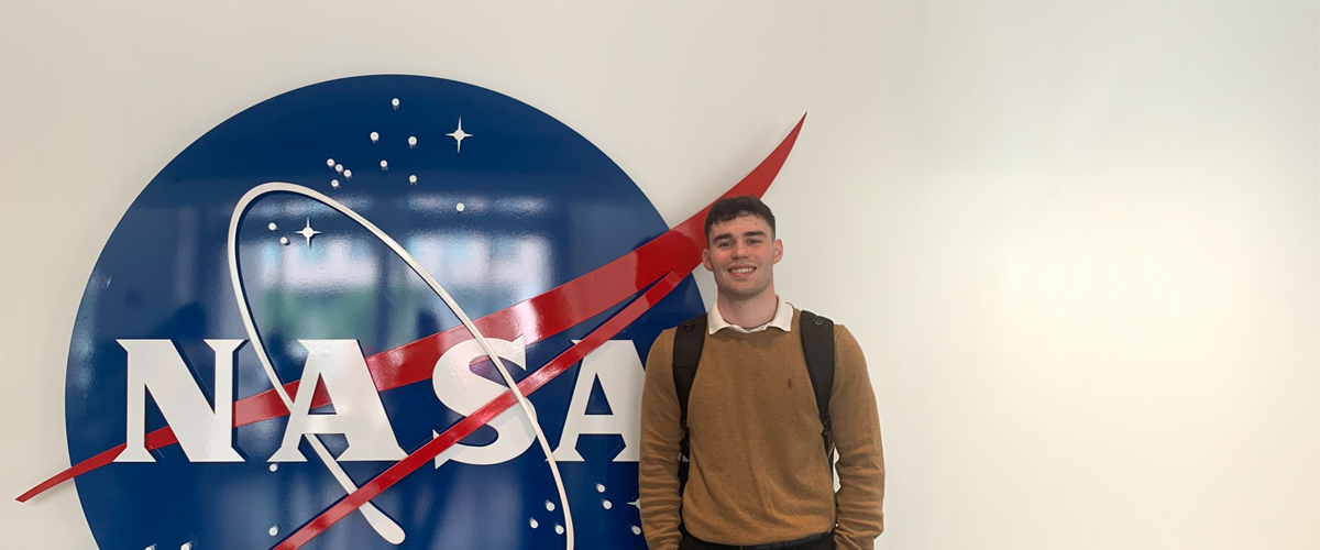 Mattia Bosio in front of a NASA sign