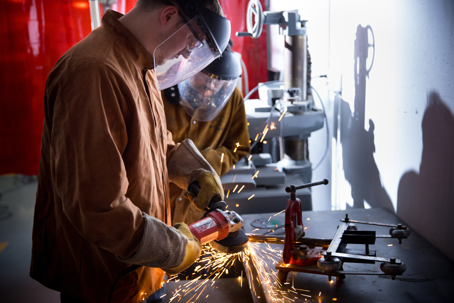 Preparing for entry into the Mechanical Engineering, M.S. program, an undergraduate student completes a project using welding equipment.