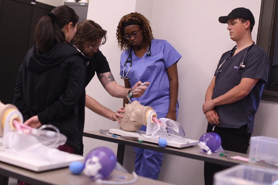 A demonstration of intubation in a simulation lab.