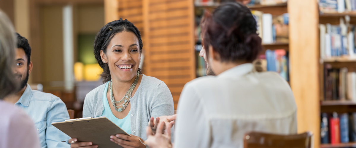 A student participates in a practice counseling session.