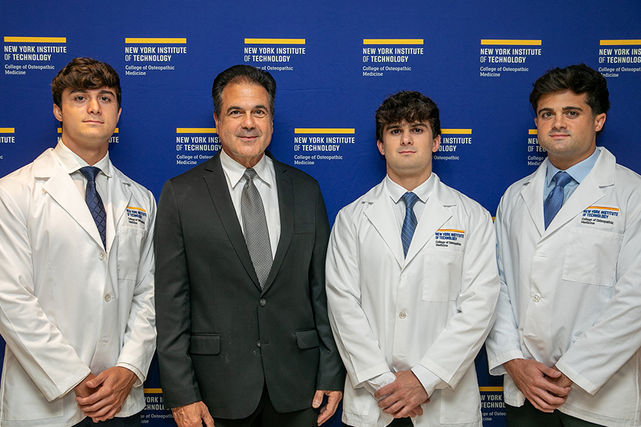 NYITCOM alumnus Phil Spadafora and sons, incoming NYITCOM students. 