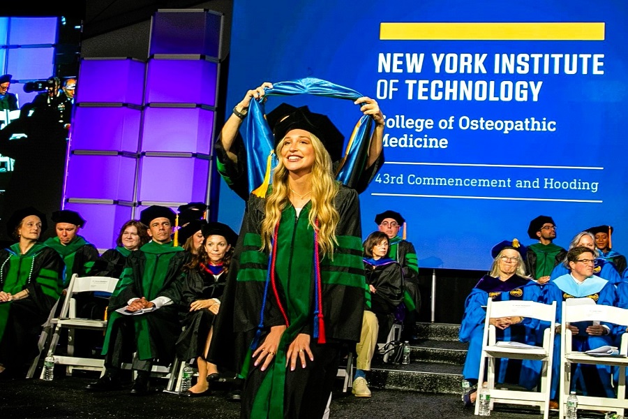 Pictured: Physician Jennifer Buoncore is hooded at the NYITCOM-Long Island ceremony.