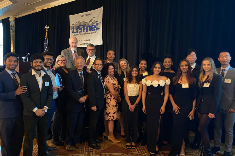 Group photo of New York Tech faculty, staff, and students