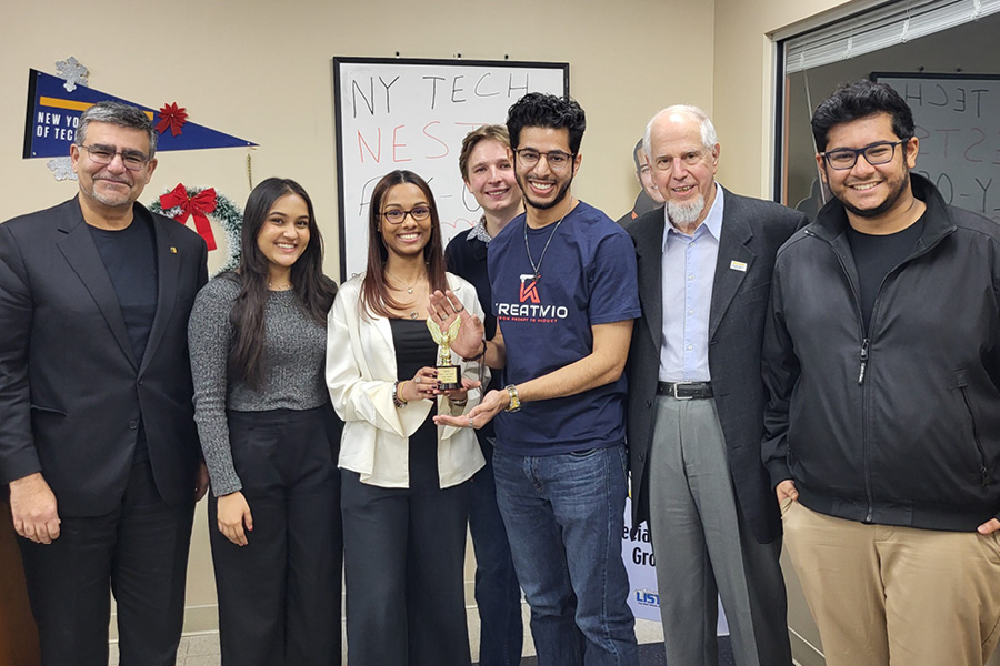 New York Tech students holding award