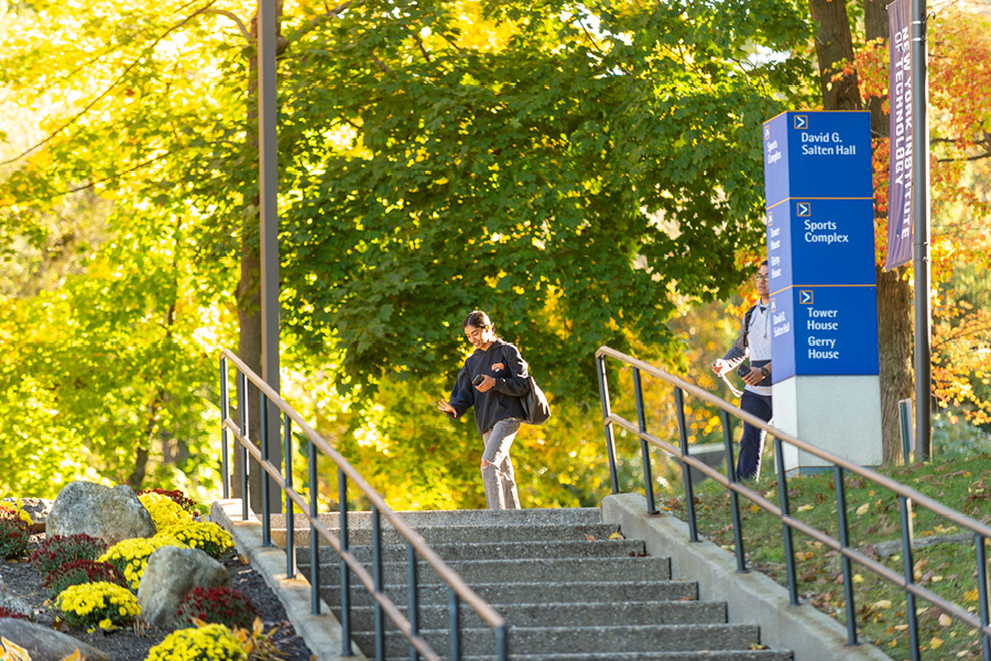 Students walking near steps on campus