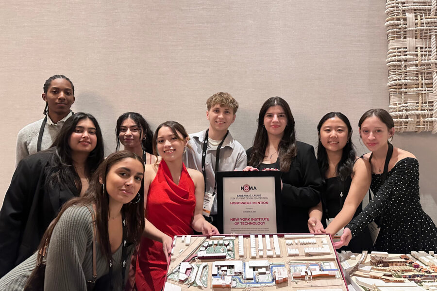 Group photo of students with architecture model