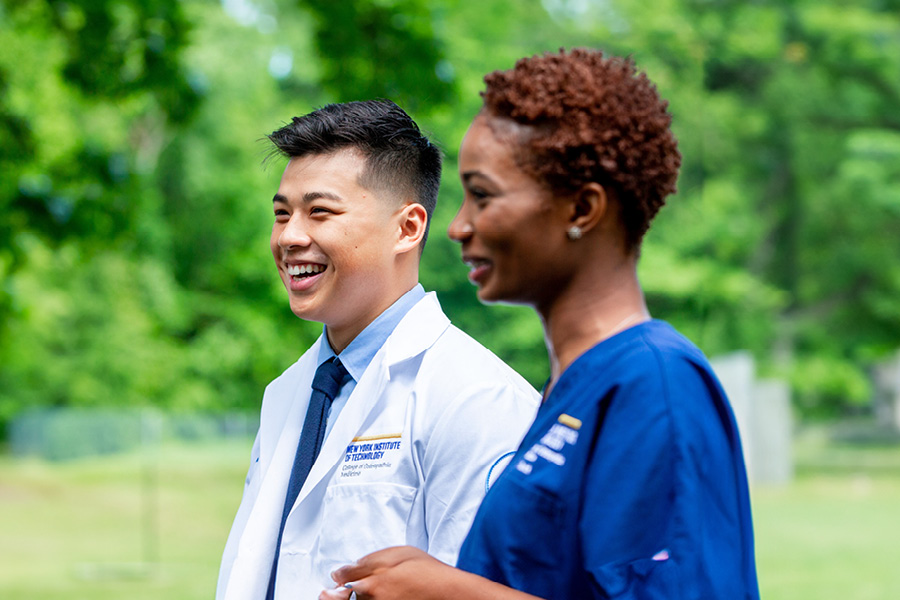 Two medical students on campus