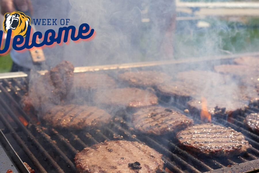 Burgers on a grill with New York Tech Week of Welcome logo