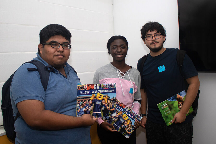 Three students posing for a picture.